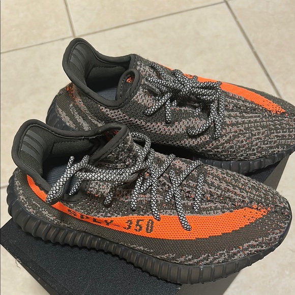 Yeezy Black and Orange Sneakers with Boost Cushioning - Picture 4 of 6